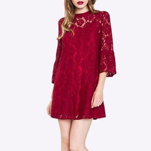 Dark red lace dress with mock neck & bell sleeves